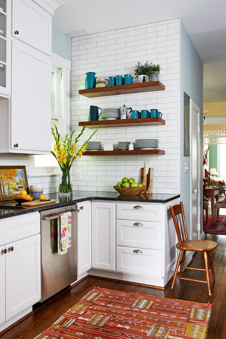 case design kitchen with wooden hanging shelves, wood flooring and white brink backsplash