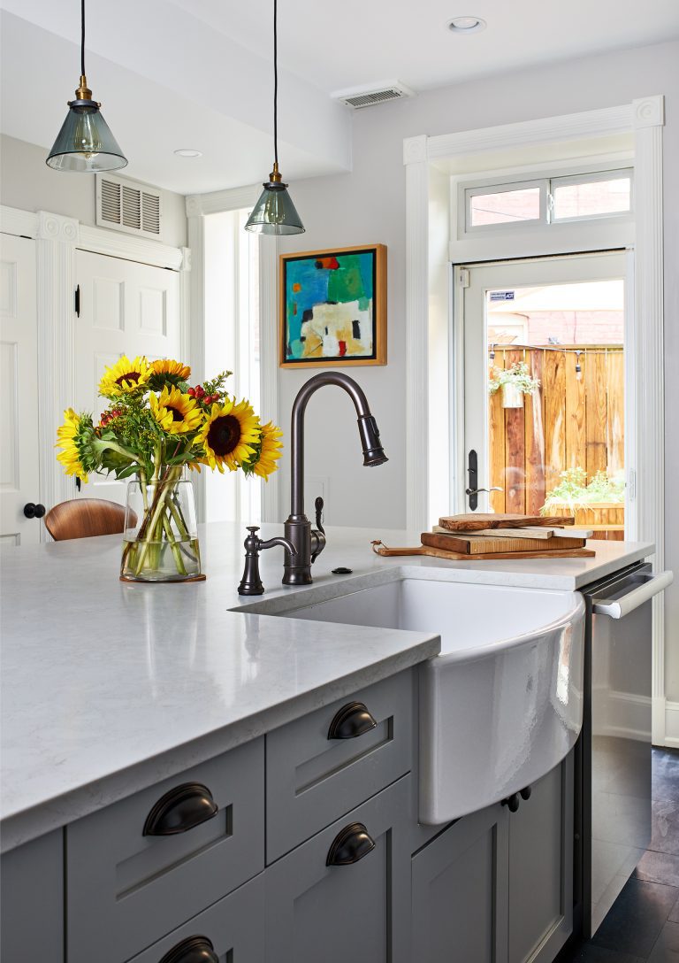 dc design large kitchen island with sink and dishwasher and seating