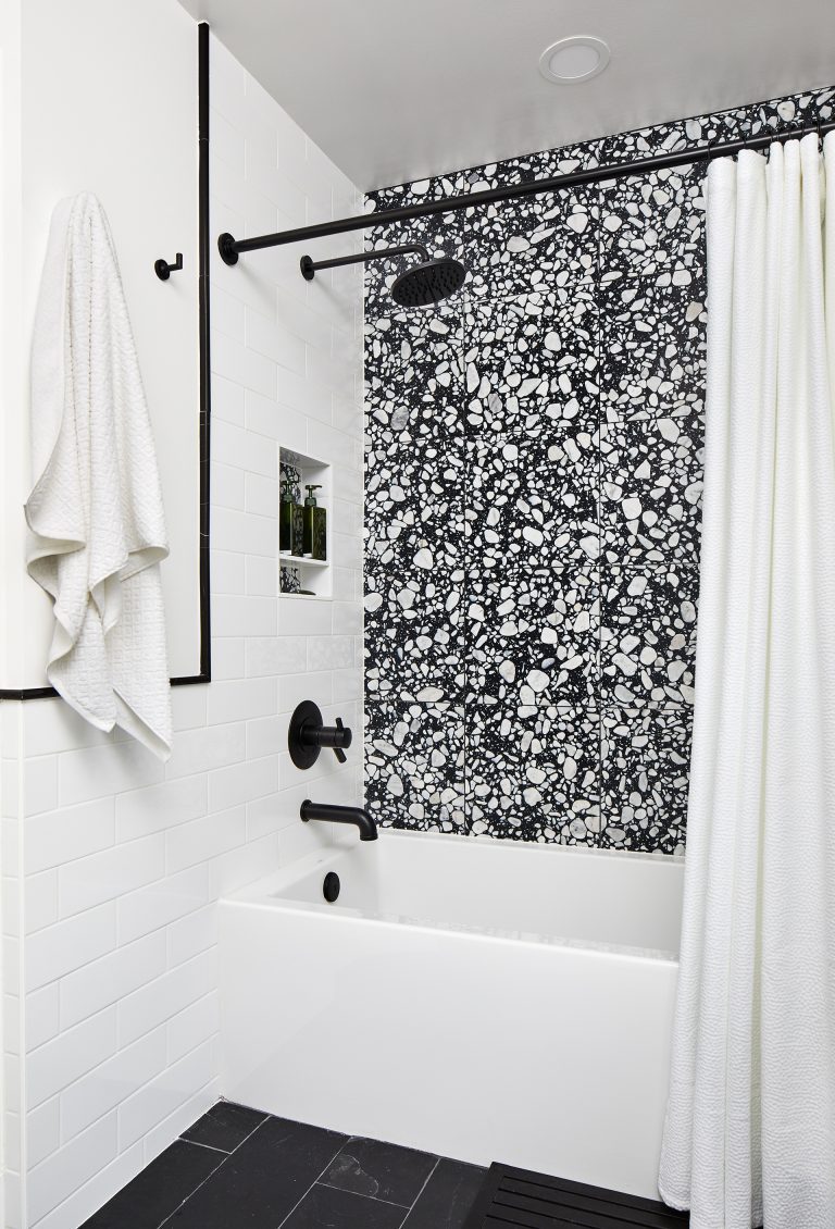 remodel bathroom in dc with matte black curtain rod with large white tub and black faucets