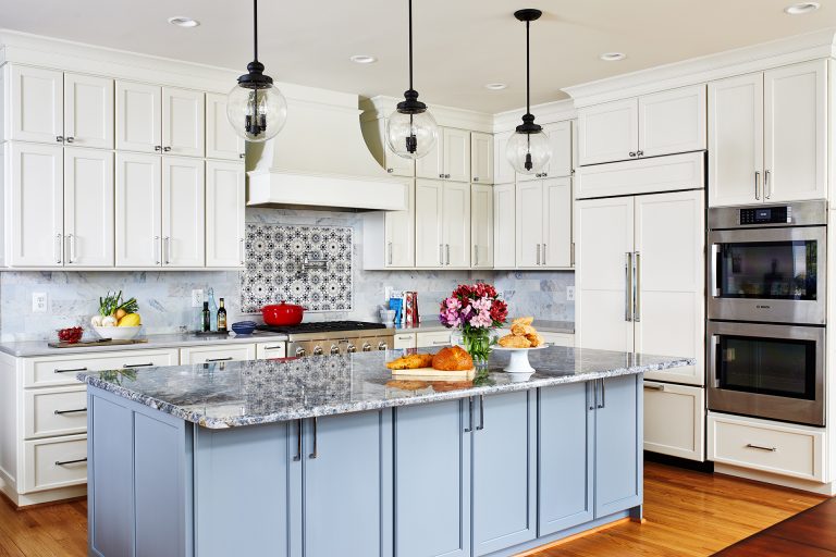 home remodeling northern Virginia brings a concealed oven range hood front upper cabinets
