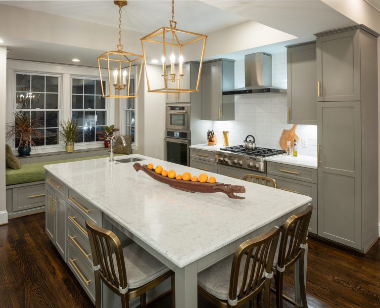 gold and white spacious kitchen island