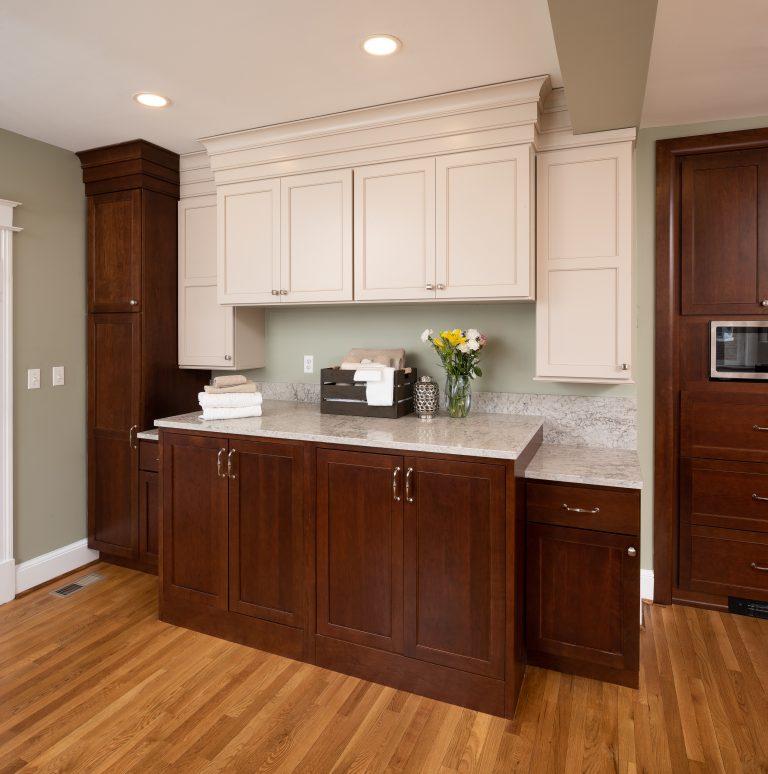 traditional kitchen with brown and white cabinets