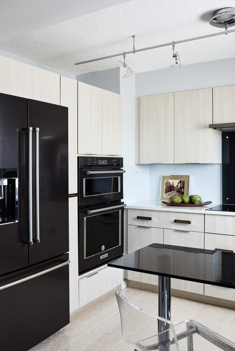 Modern Kitchen in Alexandria Virginia with black appliances and light cabinetry