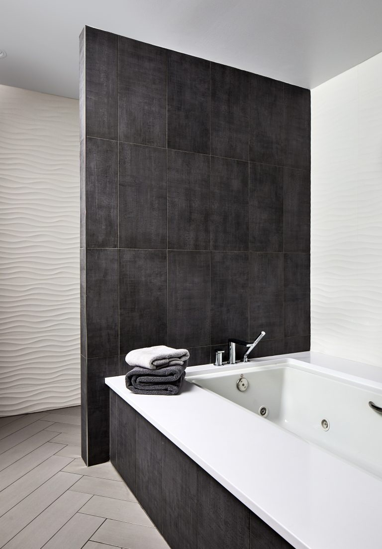 bathroom compack back wall tile with rectangular tub