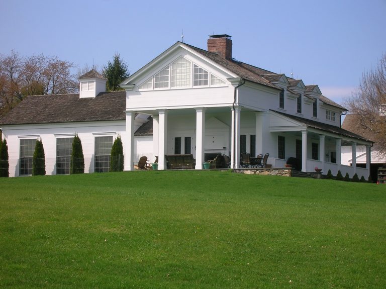 porch addition on transitional home