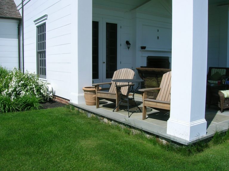 porch addition on home flagstone floor double glass doors into house