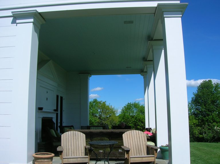 porch addition on home flagstone floor double glass doors into house