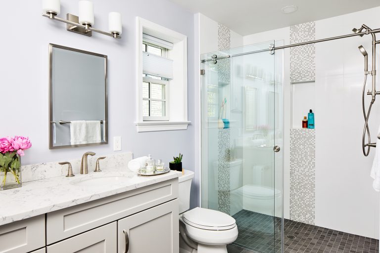 home design bathroom with single sliding frameless shower door with rolling disk