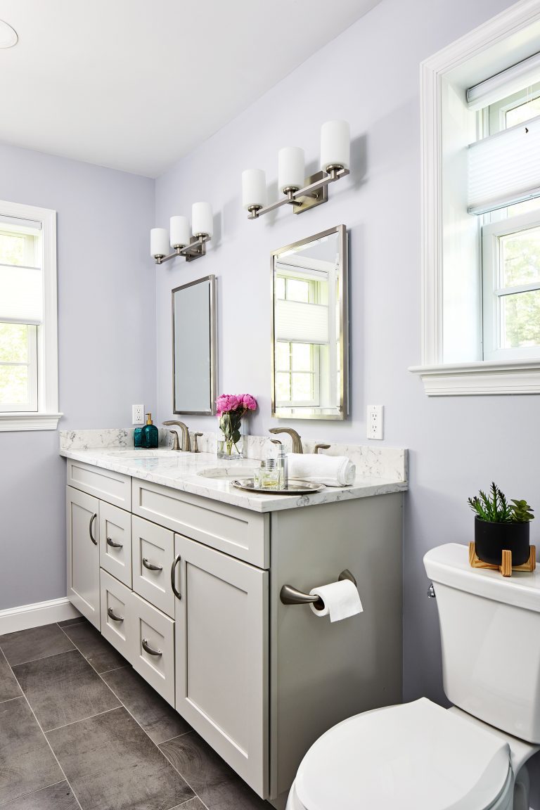 transitional bathroom with white double bathroom vanity set with mirror
