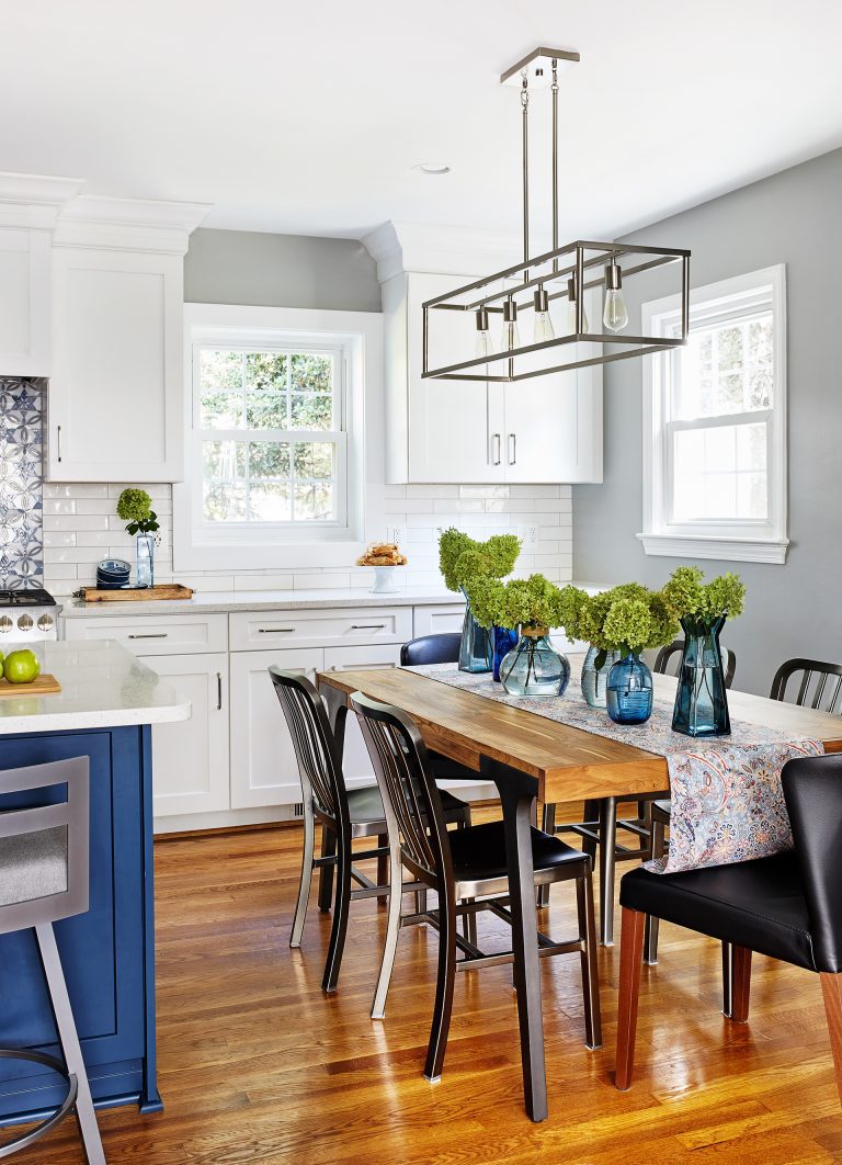 white cabinets and hard wood flooring, 5 light kitchen linear pendant above wooding table