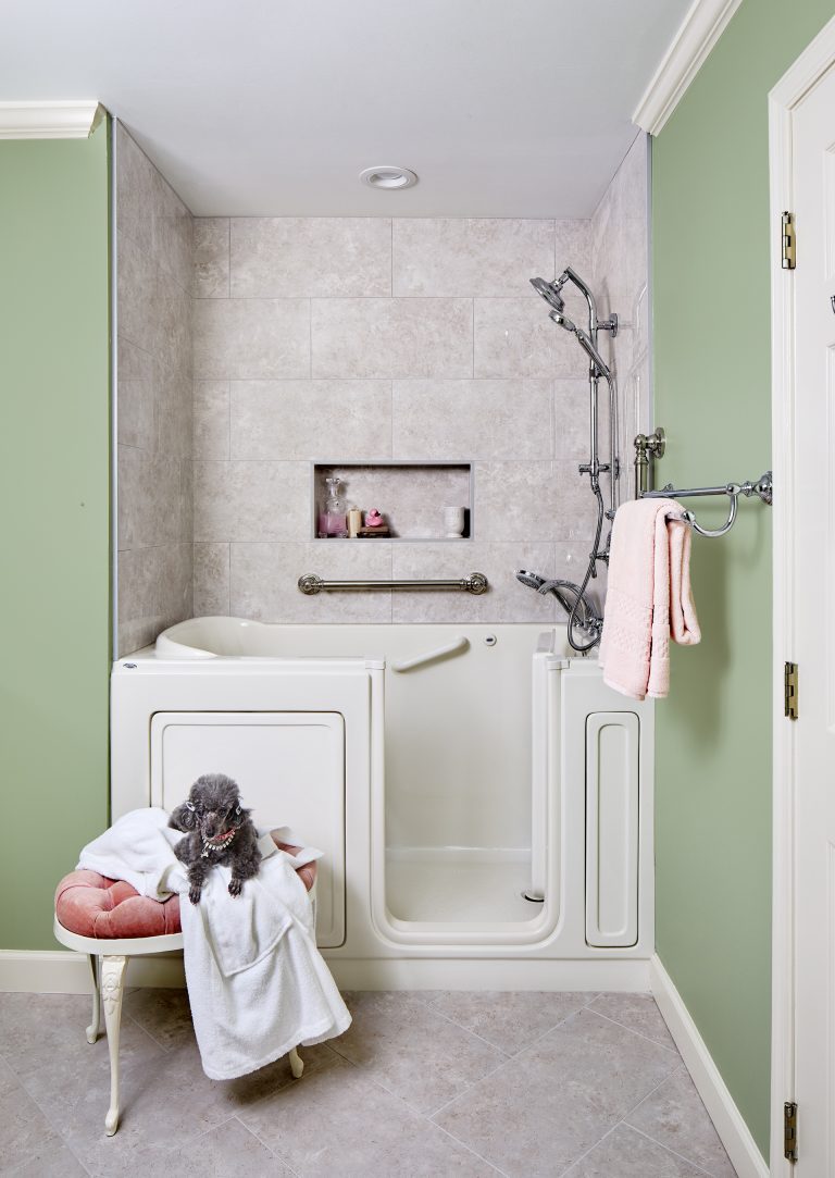 bathroom with walk-in combo tub with grab bars