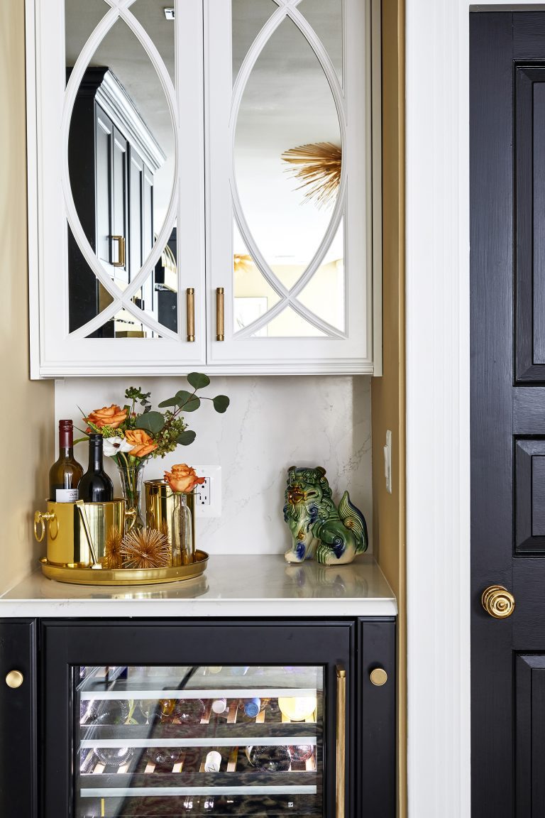 corner mini wine bar with glass white cabinet and gold handles