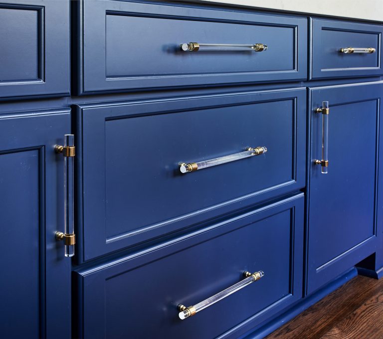 large blue wide drawers with traditional pull handles
